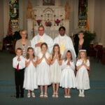 Christ the King Parish, St. Henry Church, St. Henry
Christ the King Parish celebrated First Communion at St. Henry Church in St. Henry on May 12. Shown are at 7:30 Mass.  First Row - Will Roesner, first row left, Kate Prior, Isabella Nall, Ainsley Quinn, Paige Reihle, Josie Buening. Second Row – Parish Catechetical Leader Debbie Schmitt, second row left,  Deacon James King, Administrator Father Anthony Govind and Catechist Sue Schwinghamer.
Submitted photo
