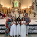 Sts. Mary and John Parish, Evansville
Sts. Mary and John Parish in Evansville celebrated First Communion on May 26. Shown are Gianna Tretter, front row left, Kajua Johnson, Ella Russell, Kim Brown, second row left, Deacon Dennis Russell, Administrator Father Benny Alikandayil Chacko, Deacon Tom Kempf and Lee Ann Kipta.
Submitted photo