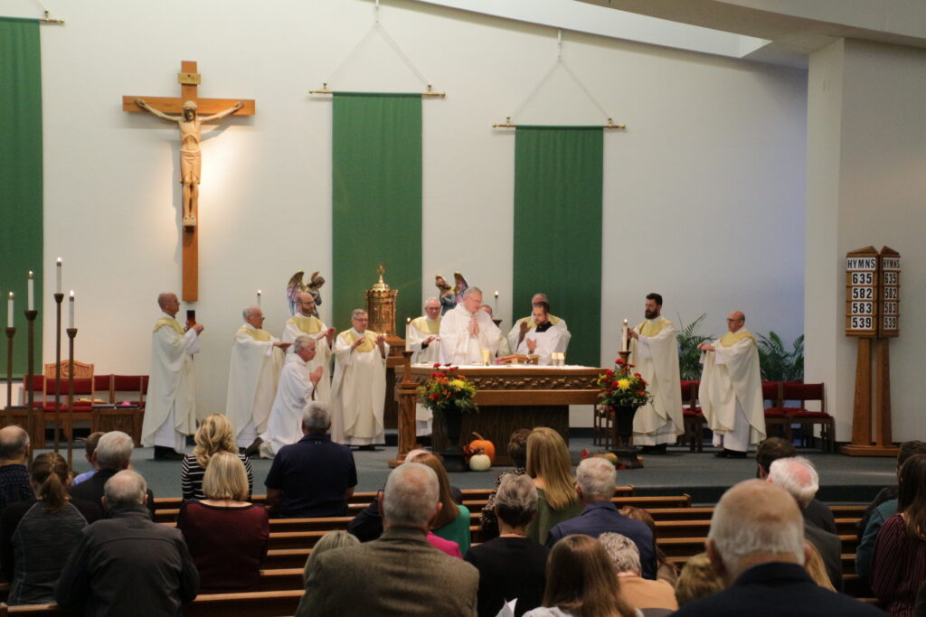 Bishop Joseph M. Siegel concelebrates Mass with nine priests of the Diocese of Evansville to open the 2019 diocesan Respect Life Celebration. Good Shepherd Parish in Evansville hosted the Oct. 17 event. The Message photo by Tim Lilley