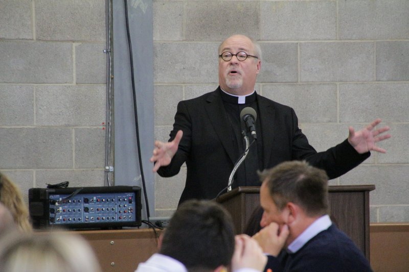 Father Denis Robinson tells attendees of the Nov. 7 Serra Club Vocations Awards Luncheon that “all of us are called to build up the kingdom of God.” The Message photo by Tim Lilley
