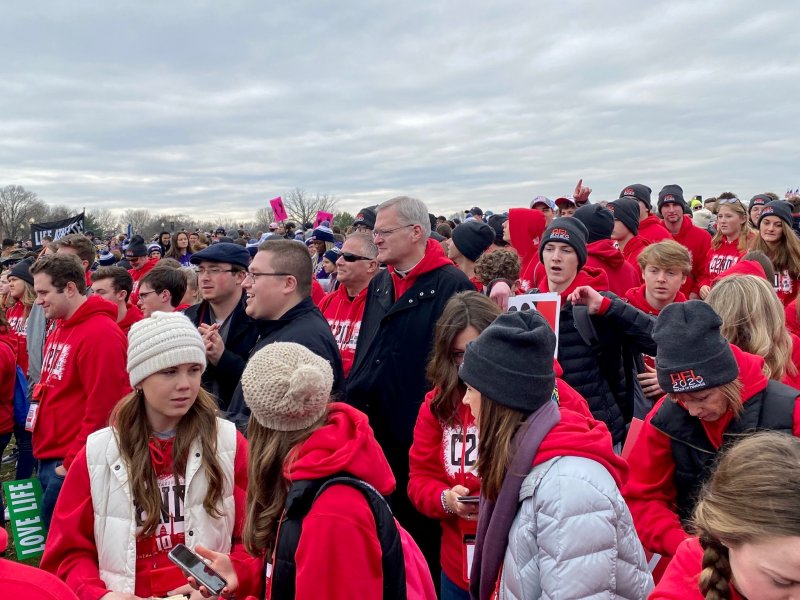 Bishop Joseph M. Siegel, center, joined our pilgrims for the Jan. 24 march. Standing in front of him in the dark coats are Diocese of Evansville seminarians Tyler Underhill, wearing a hat, and Keith Hart. Photo by Father Jason Gries, special to The Message