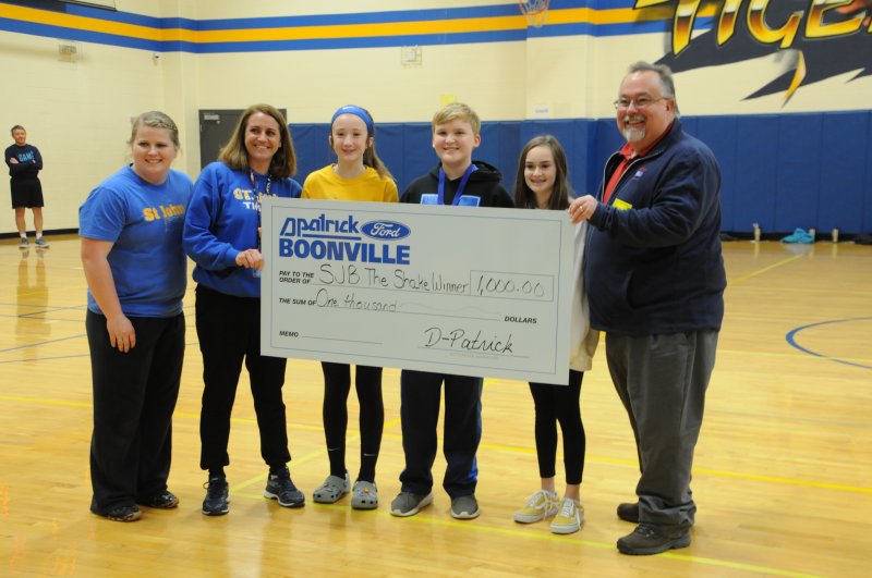The winners of the first-ever SJB Shake were announced at a schoolwide assembly on Jan. 30. Pictured are: middle school science teacher Megan Wade, left; Principal Elizabeth Flatt; seventh-grader Abby Price, second place; sixth-grader Tyler Schmitt, first place; seventh-grader Marilyn Cox, third place; and Tony Toomy, D-Patrick Boonville Ford representative.
The Message photo by Megan Erbacher
