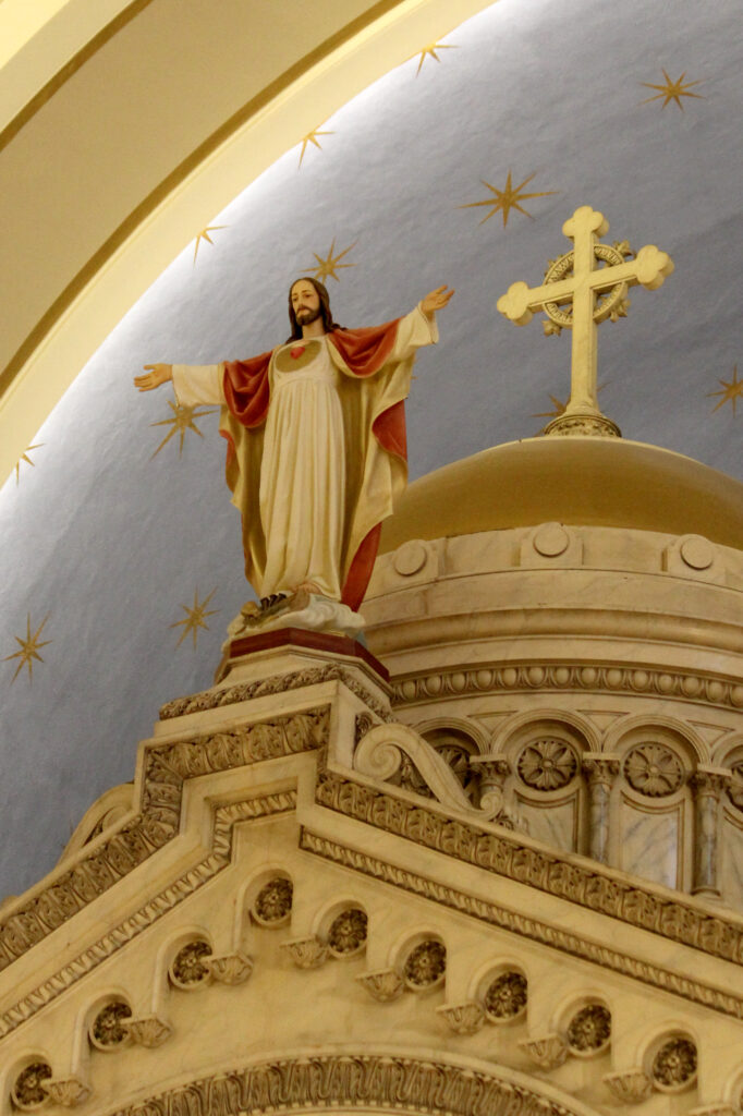 Sacred Heart of Jesus atop the baldacchino