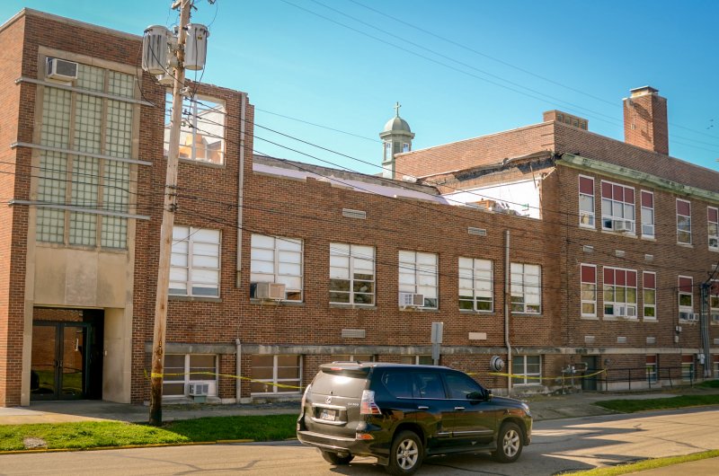 A view of Rivet High School where a brick wall and the roof are missing in the third-floor science room after an April 8 severe storm. The Message photo by Kevin Kilmer