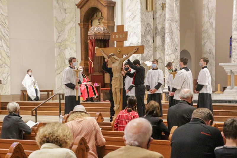 Those in attendance venerated the Crucifix from their seats. The Message photo by Tim Lilley