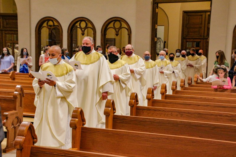 More than 45 priests of the Diocese of Evansville process into St. Benedict Cathedral at the start of the March 30 diocesan Chrism Mass. The Message photo by Tim Lilley