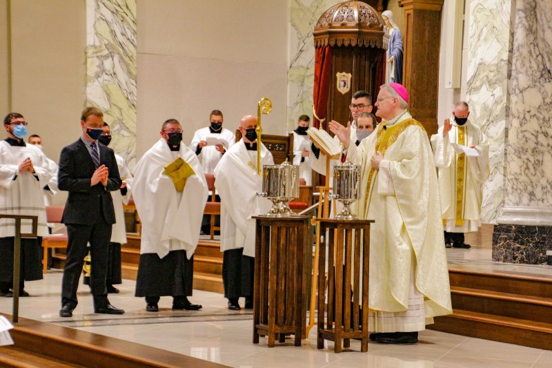 Bishop Siegel blesses the Sacred Chrism. The Message photo by Tim Lilley