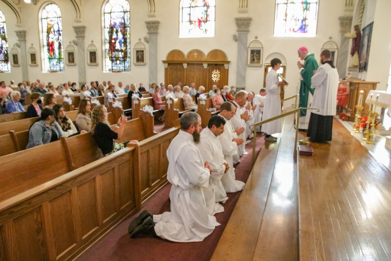 Bishop Siegel blesses the 12 candidates for the permanent diaconate, who are scheduled to be ordained in the summer of 2022. The Message photo by Tim Lilley