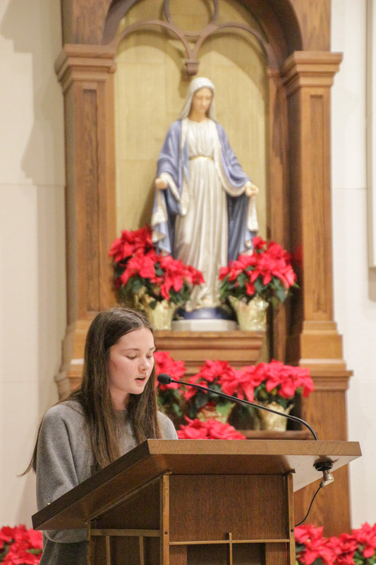  Mater Dei High School Senior Jessie Bacon of St. Philip Parish in Posey County helped lead the Rosary for Life during the Holy Hour.
The Message photo by Tim Lilley