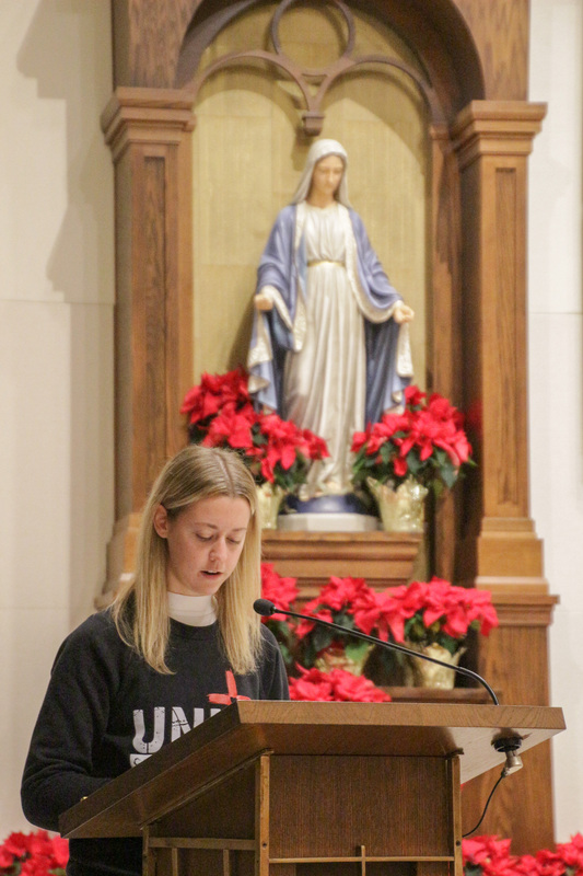 Mater Dei High School Senior Morgan Wilmes of Corpus Christi Parish in Evansville helped lead the Rosary for Life during the Holy Hour. The Message photo by Tim Lilley