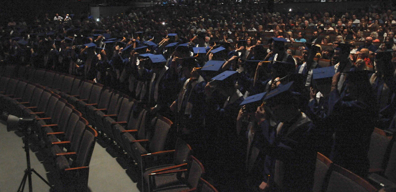 Reitz Memorial’s Class of 2022, which included 130 graduates,
move their tassels to signify their status as high school graduates during the May 22
commencement ceremony.  The Message photo by Megan Erbacher