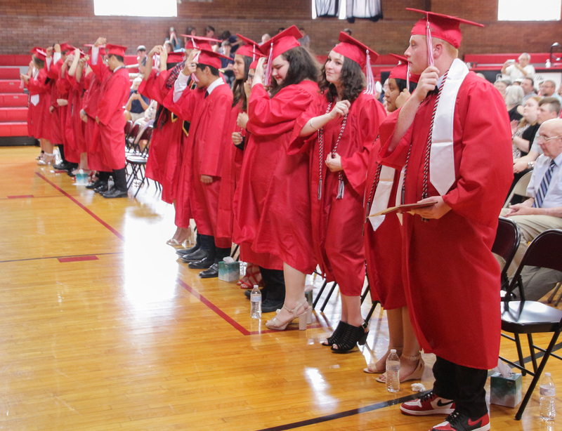 Members of the Washington Catholic class of 2022 move their tassels to signify their
status as graduates during the May 21 commencement ceremony. The Message photo by Tim Lilley