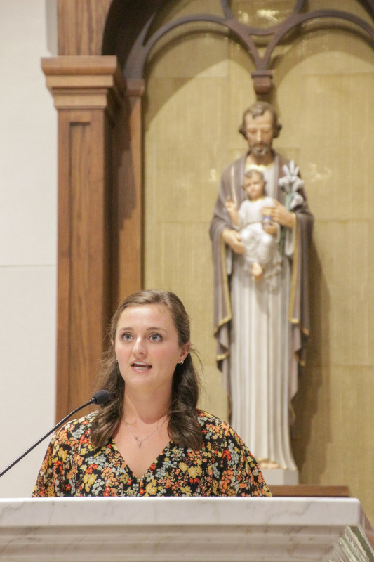Emily Walker, the daughter of newly ordained Deacon Ed Walker, served as one of the lectors for the Mass. The Message photo by Tim Lilley