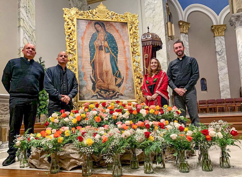Fathter Juan Ramirez, left, Father Homero Rodriguez, Bertha Melendres, director of the Office of Hispanic Ministry, and Father Martin Estrada stand with the painting of Our Lady of Guadalupe, which is permanently housed in the sanctuary of St. Benedict Cathedral in Evansville. Submitted photo