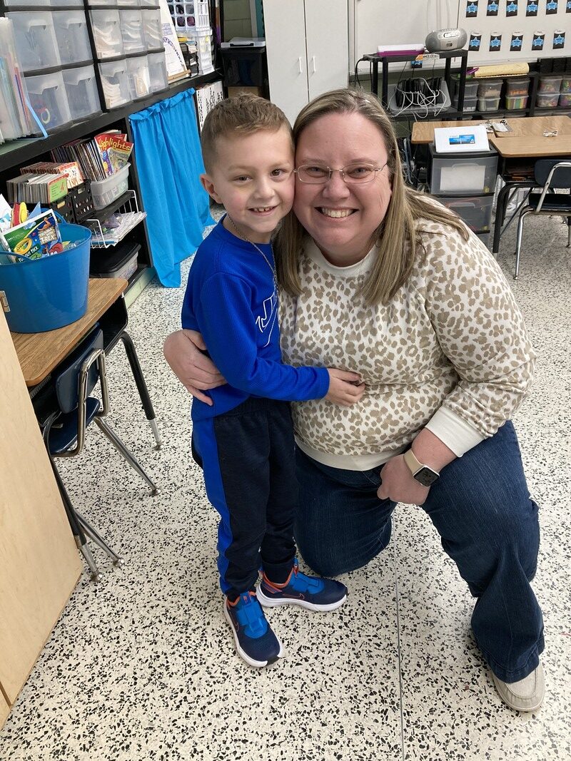 Mason Mileham, left, is pictured with his St. Matthew School kindergarten teacher, Devon Duckworth, in March 2022. Duckworth said, “This is my favorite picture of him. He came to visit the teachers after he had been out for a few weeks. This sadly ended up being the last time I saw him, but he was so happy, even though he was so sick.” Submitted photo